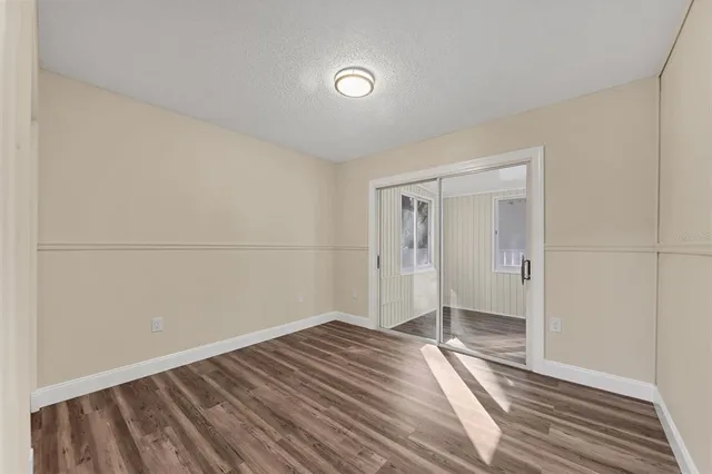 a view of a livingroom with wooden floor
