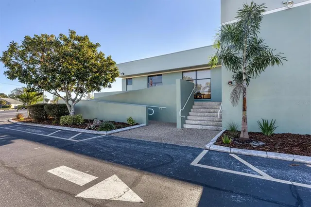 a front view of a house with garage
