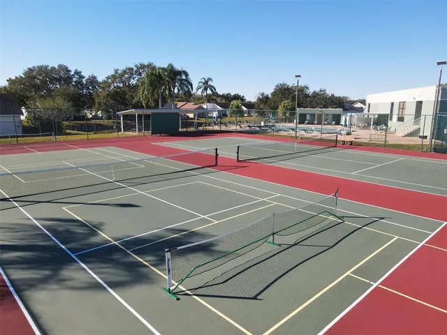 a tennis court that has tennis net