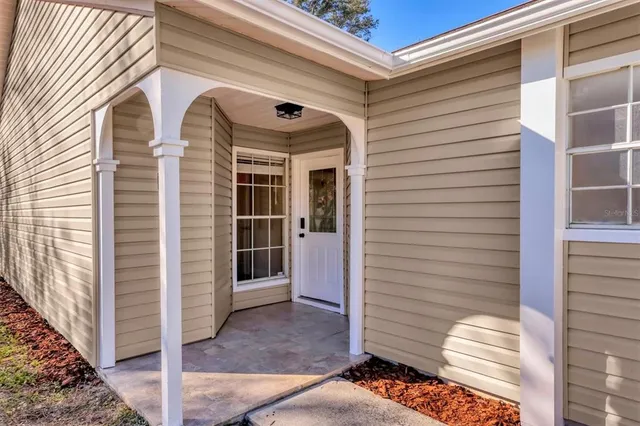 a view of front door and porch