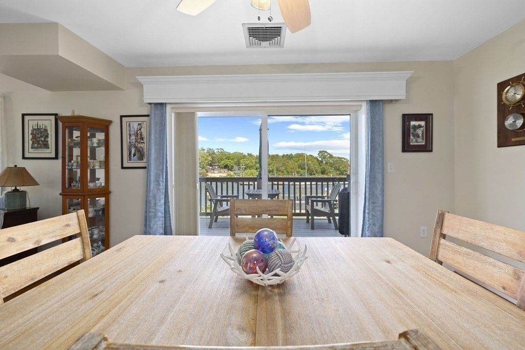 45 Main Street, Unit 111 Wareham, MA 02571 - Photo 14 of 20 a bedroom with a large bed and a large window