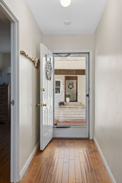 45 Main Street, Unit 111 Wareham, MA 02571 - Photo 2 of 20 a view of a hallway with wooden floor and closet