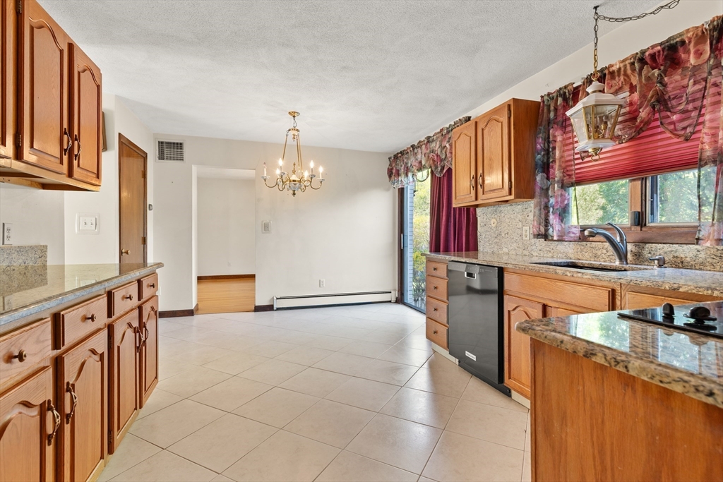 34 Coolidge Road Winchester, MA 01890 - Photo 11 of 33 a view of a kitchen cabinets and a counter top space