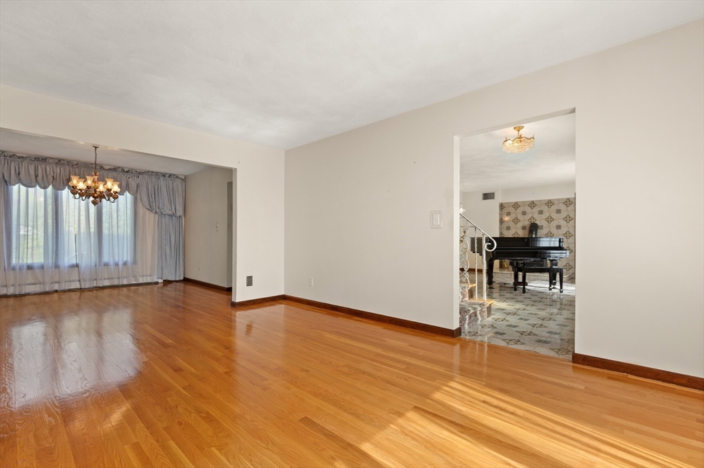 34 Coolidge Road Winchester, MA 01890 - Photo 14 of 33 a view of a livingroom with wooden floor