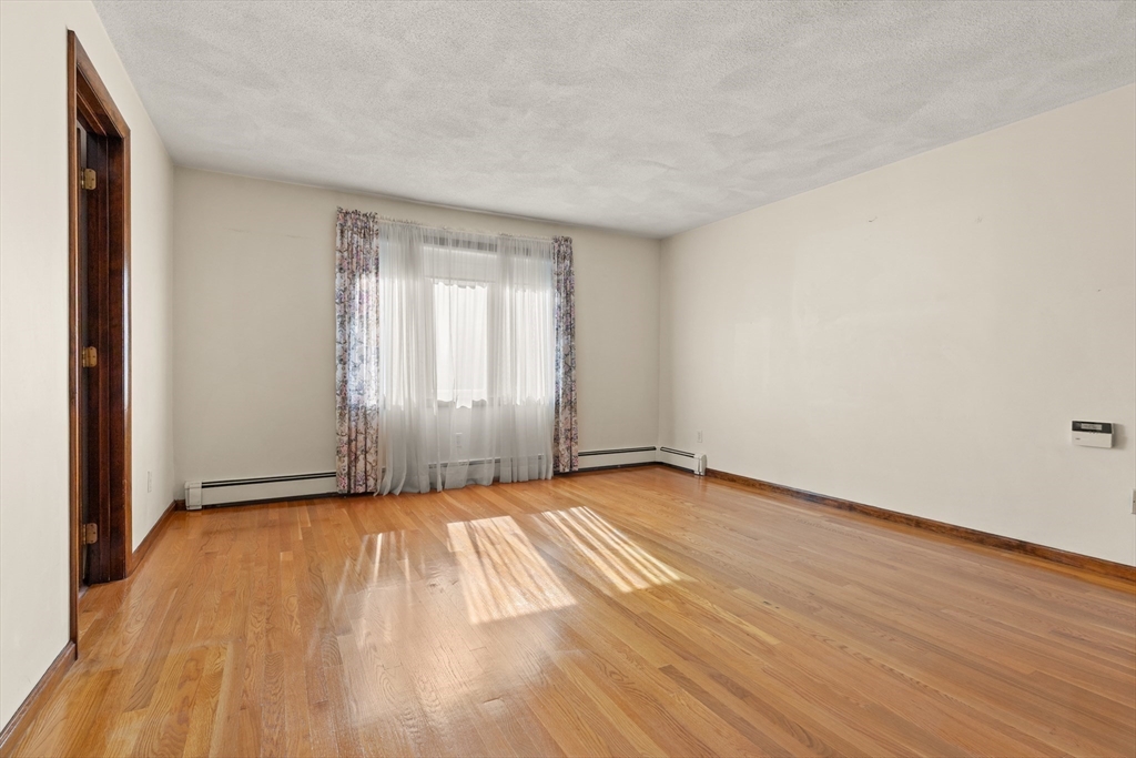 34 Coolidge Road Winchester, MA 01890 - Photo 18 of 33 a view of an empty room and window
