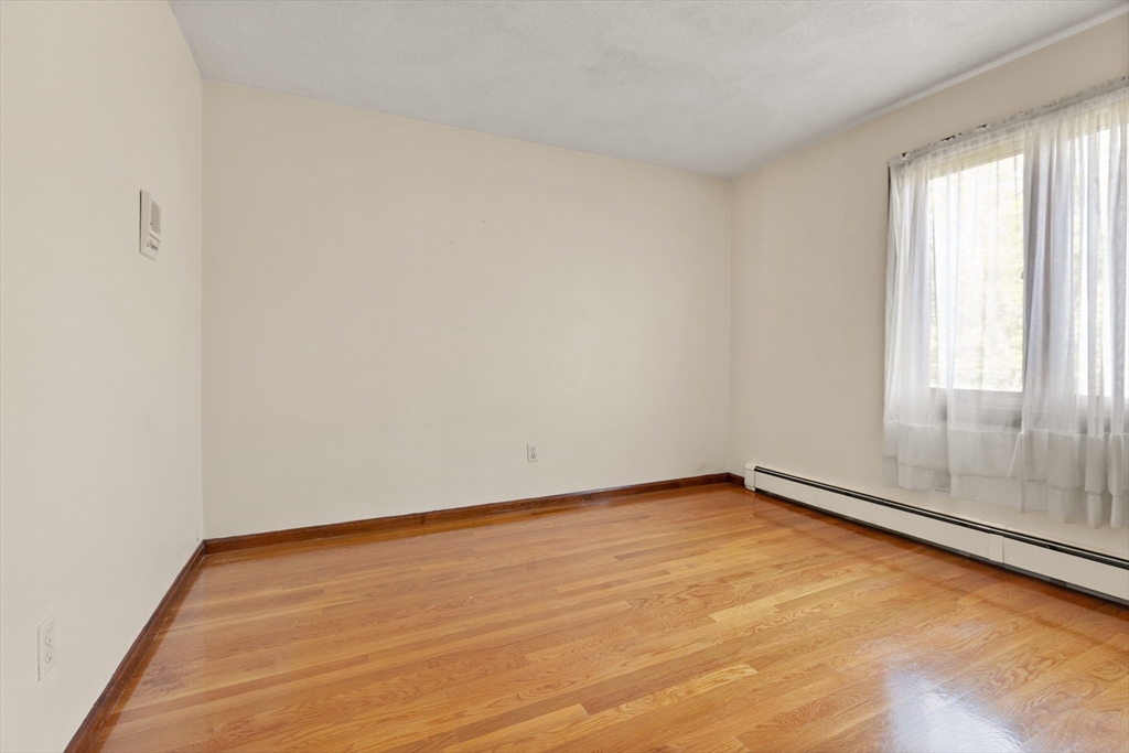 34 Coolidge Road Winchester, MA 01890 - Photo 19 of 33 a view of an empty room and window