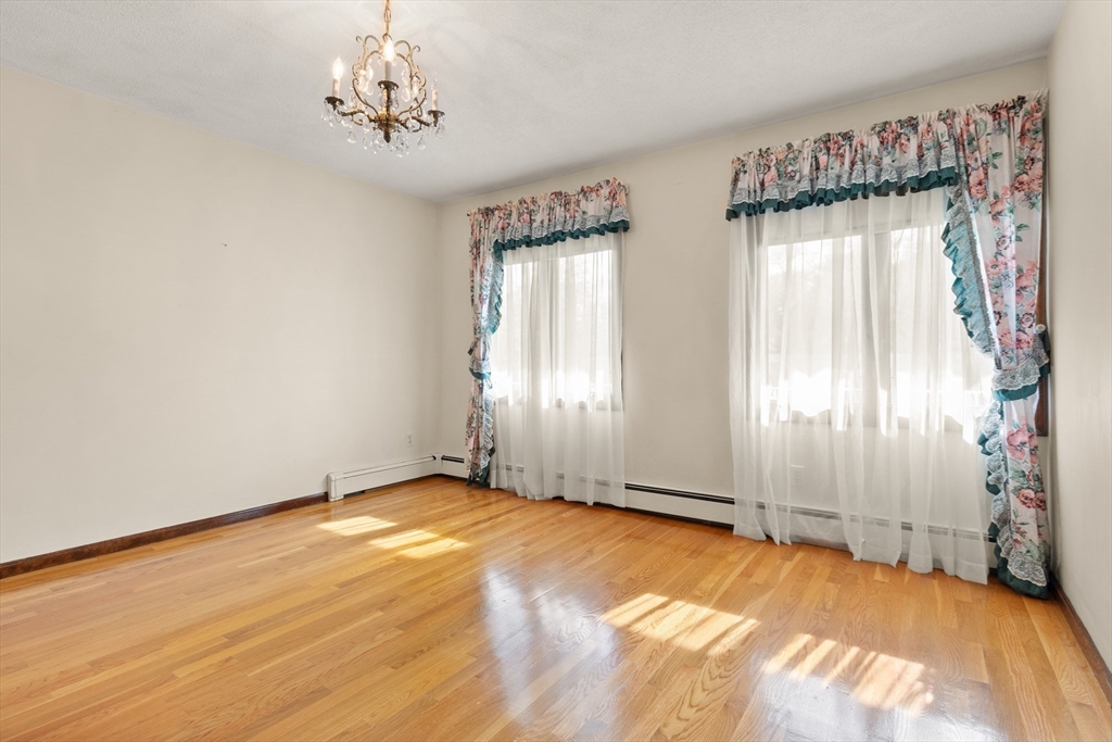 34 Coolidge Road Winchester, MA 01890 - Photo 21 of 33 a view of an empty room with a window