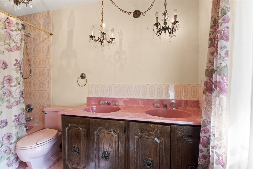34 Coolidge Road Winchester, MA 01890 - Photo 23 of 33 a bathroom with a sink toilet and shower