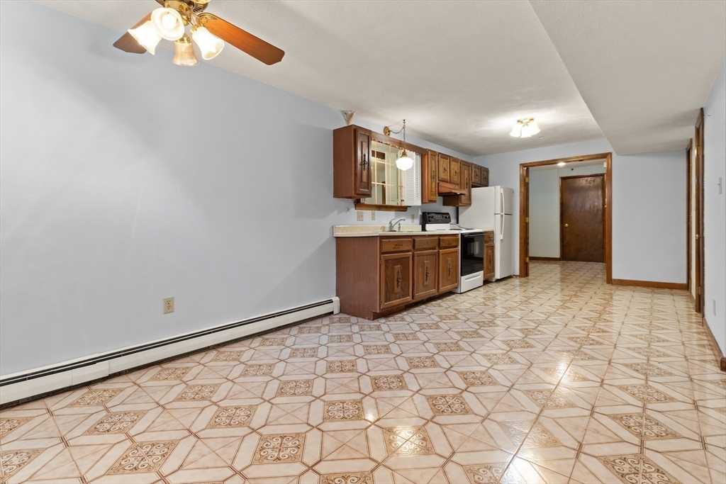 34 Coolidge Road Winchester, MA 01890 - Photo 24 of 33 a view of a kitchen with a sink