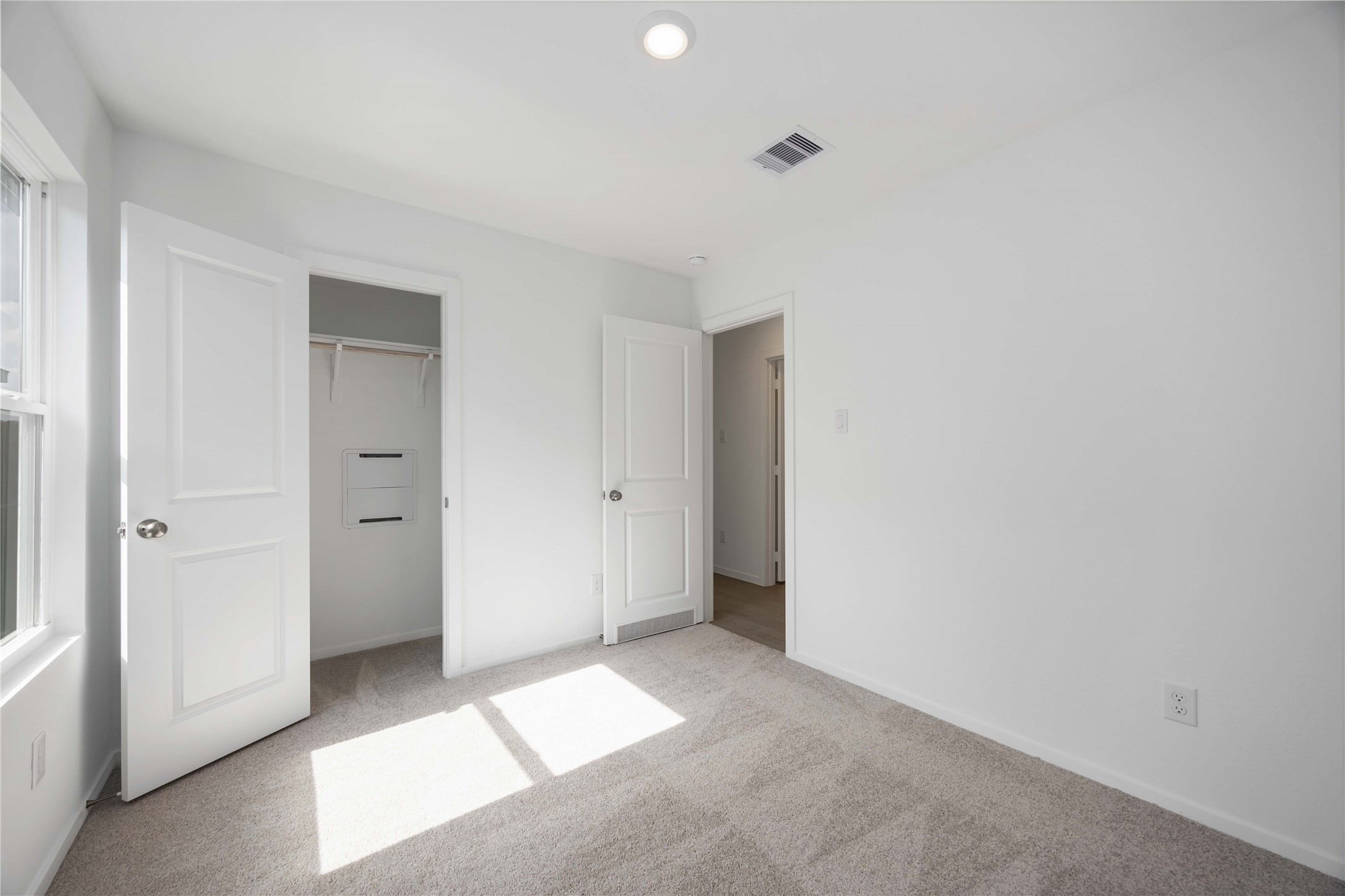 385 Lucia Way Cleveland, TX 77327 - Photo 18 of 30 a view of a room with an empty space