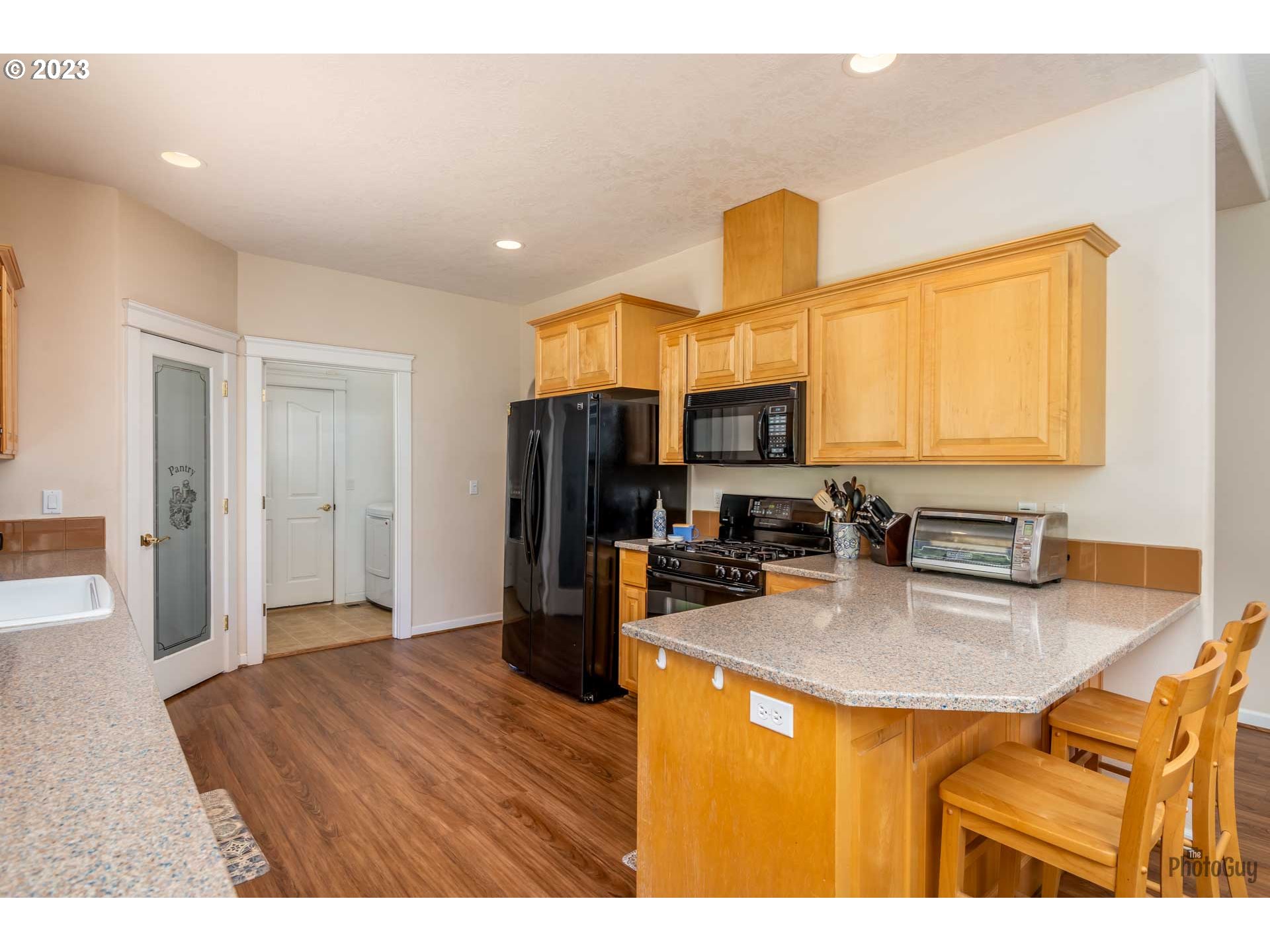 3501 Falcon Drive Springfield, OR 97477 - Photo 3 of 31 a kitchen with refrigerator and window