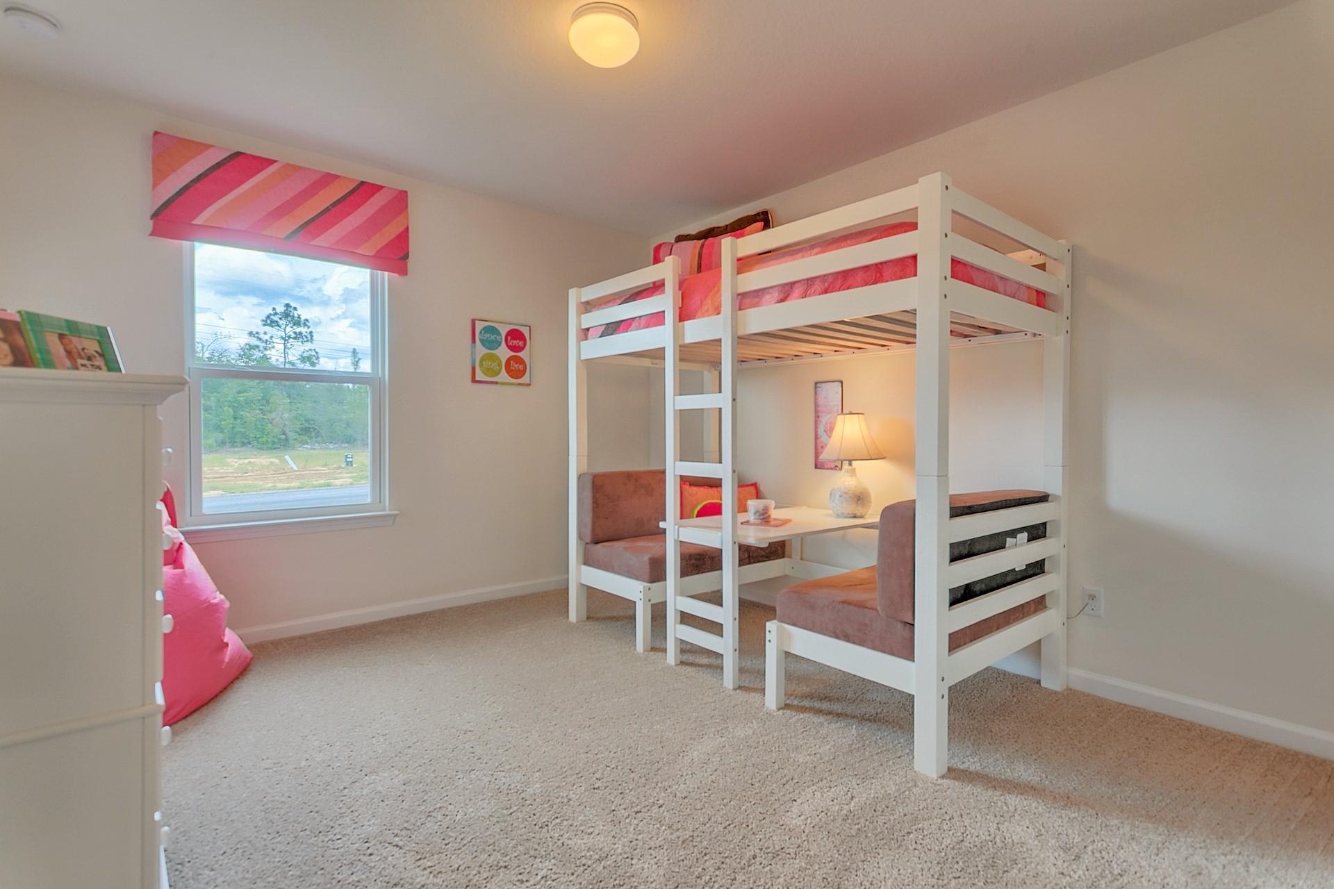 334 Merlin Court Crestview, FL 32539 - Photo 13 of 19 a bedroom with a bed and a window
