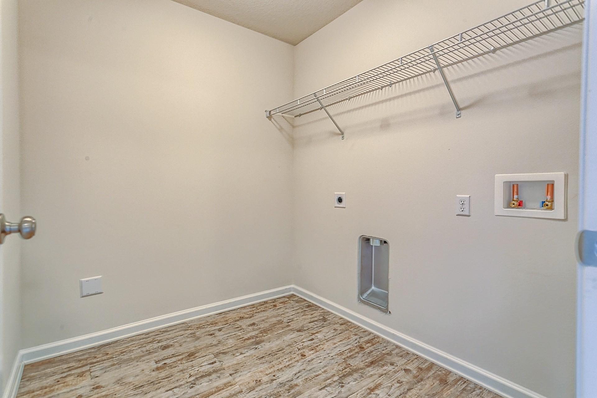 334 Merlin Court Crestview, FL 32539 - Photo 15 of 19 a view of a small space with wooden floor