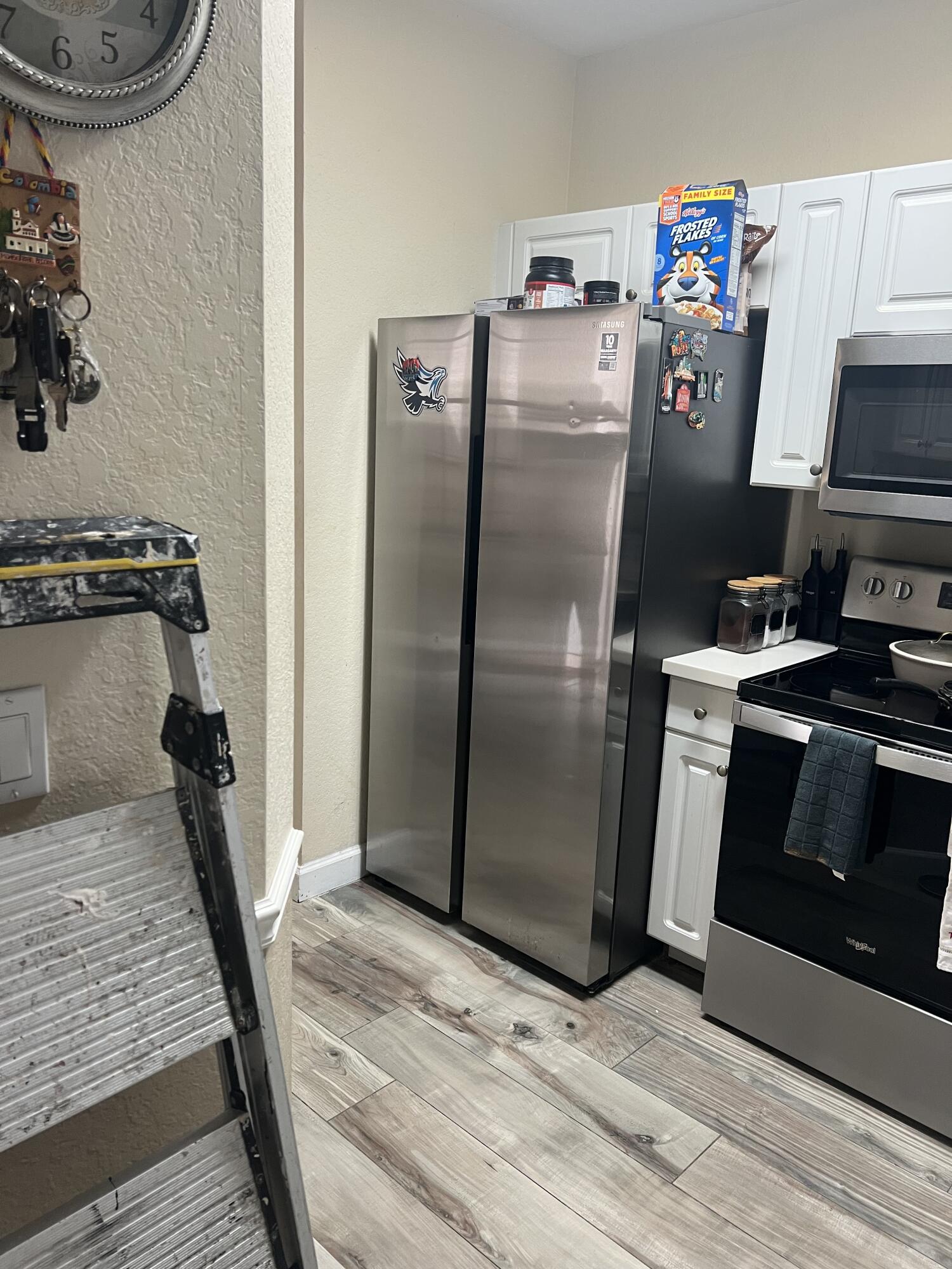 4110 Napoli Lake Drive Riviera Beach, FL 33410 - Photo 3 of 17 kitchen view 2 SS appliances 4110