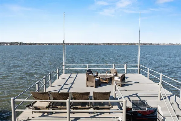 a terrace of a house with outdoor seating