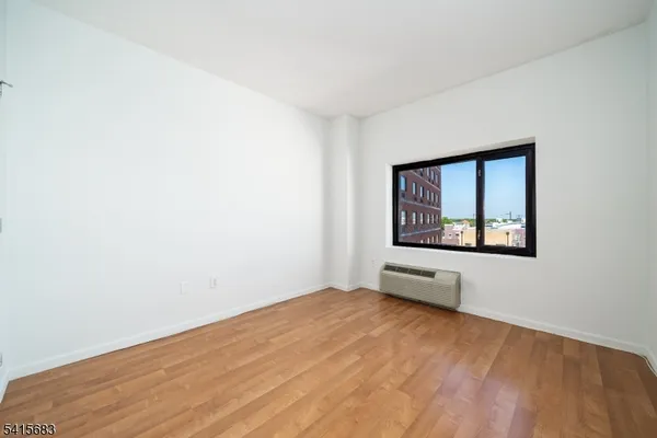 a view of an empty room with window