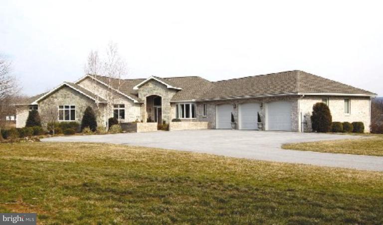 1133 Ragged Edge Road Chambersburg, PA 17202 - Photo 13 of 30 a front view of a house with a yard