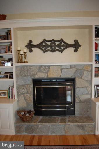 1133 Ragged Edge Road Chambersburg, PA 17202 - Photo 23 of 30 a stove top oven sitting inside of a kitchen