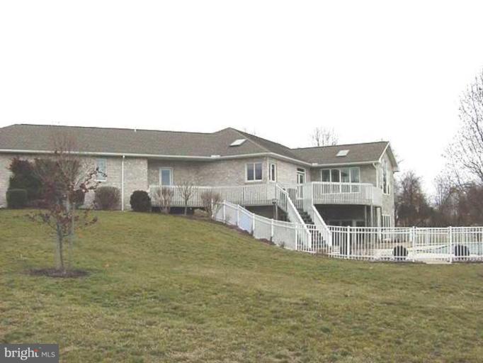 1133 Ragged Edge Road Chambersburg, PA 17202 - Photo 30 of 30 a view of a house with a yard