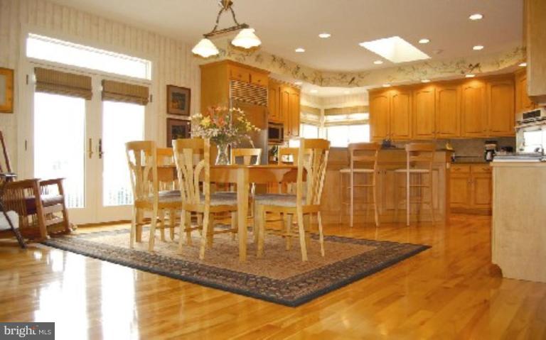 1133 Ragged Edge Road Chambersburg, PA 17202 - Photo 3 of 30 a view of a swimming pool and dining room