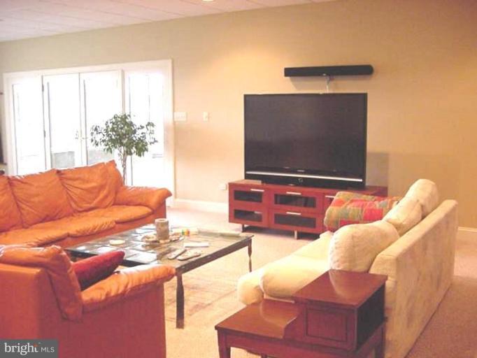 1133 Ragged Edge Road Chambersburg, PA 17202 - Photo 5 of 30 a living room with furniture and a flat screen tv