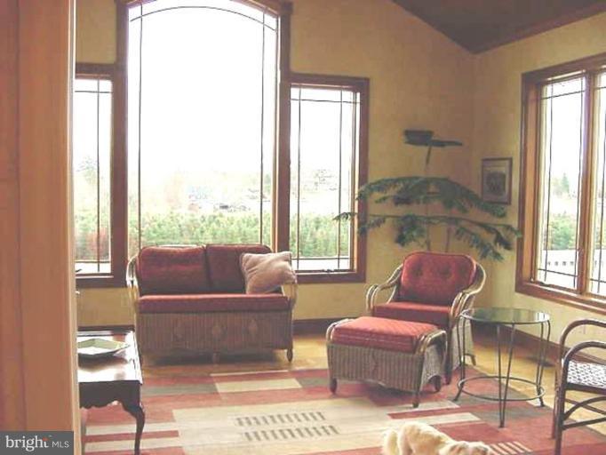 1133 Ragged Edge Road Chambersburg, PA 17202 - Photo 9 of 30 a living room with furniture and a window