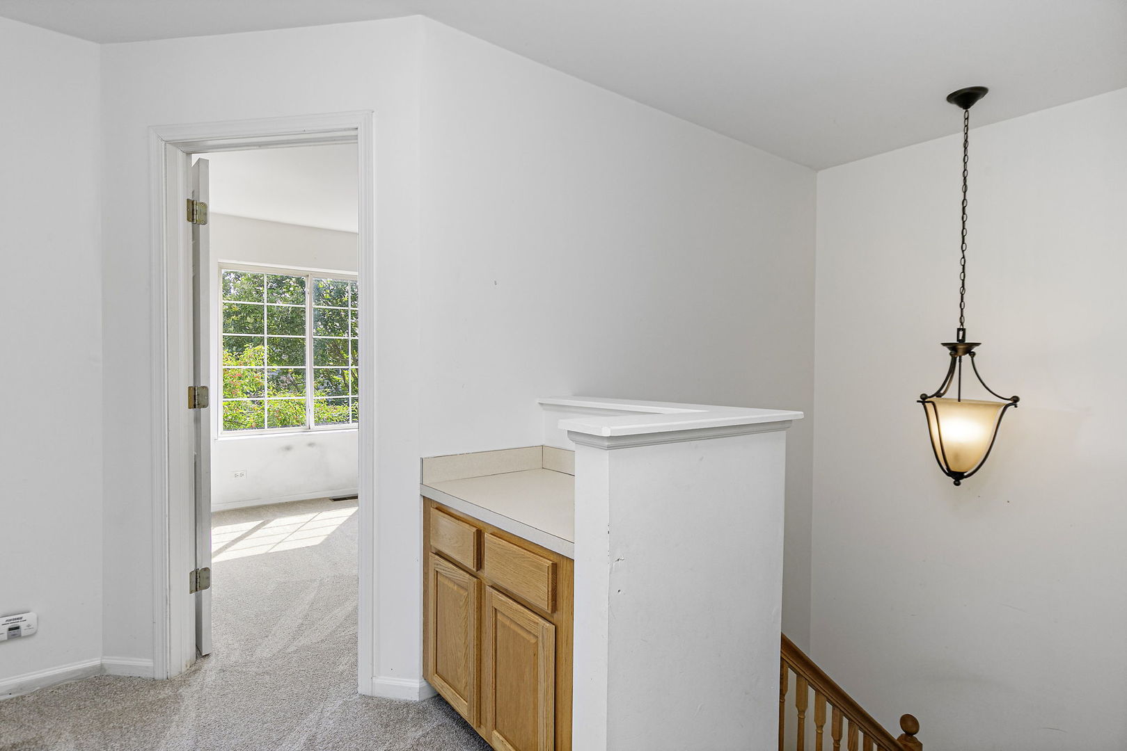 71 Monarch Drive Streamwood, IL 60107 - Photo 10 of 19 a view of hallway with washer and dryer
