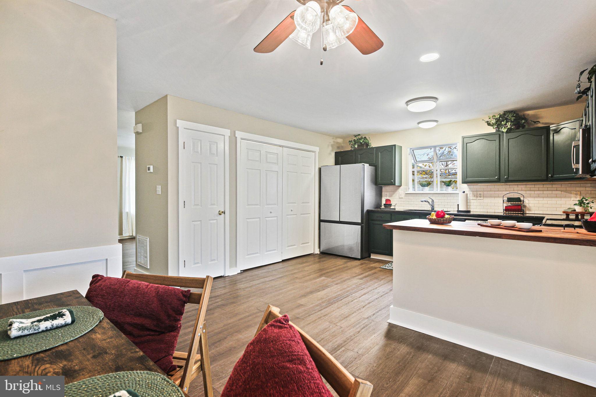 1617 Midland Road Edgewater, MD 21037 - Photo 10 of 41 a living room with furniture and kitchen view