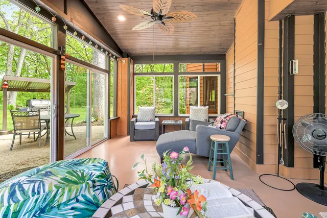 a bedroom with a bed and a mirror