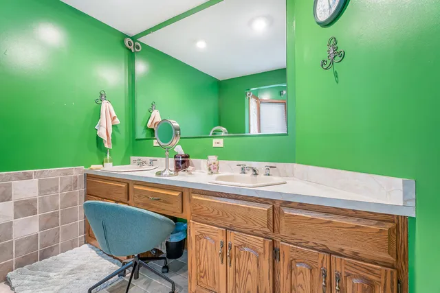 a view of a house with a yard and garage