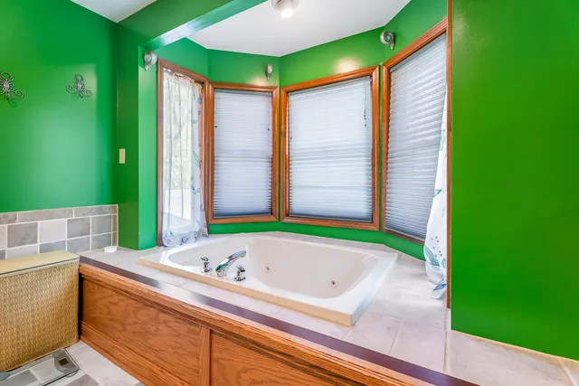 a view of a backyard with sitting area