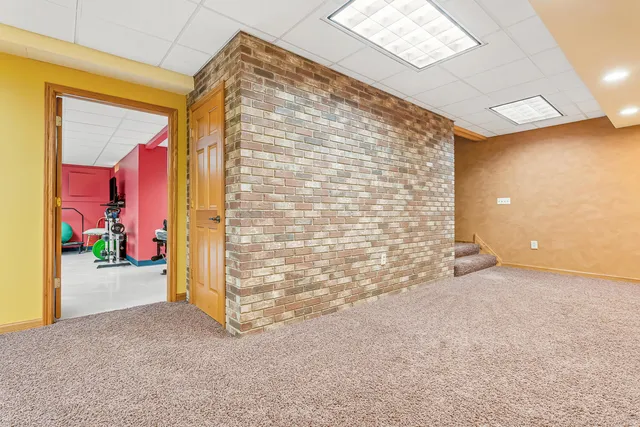 a view of a back yard of the house