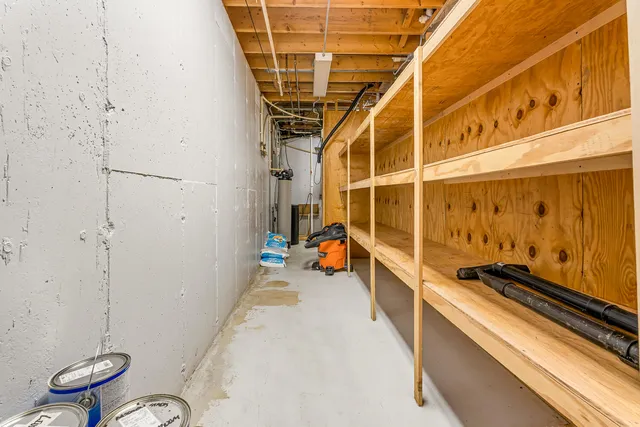 a aerial view of a house with swimming pool and garden