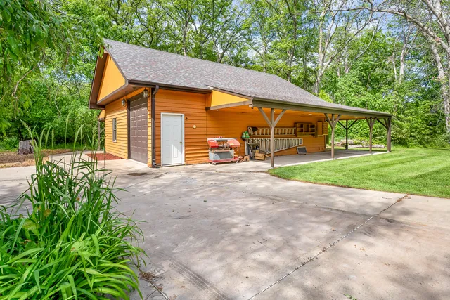 a view of a yard with an outdoor space