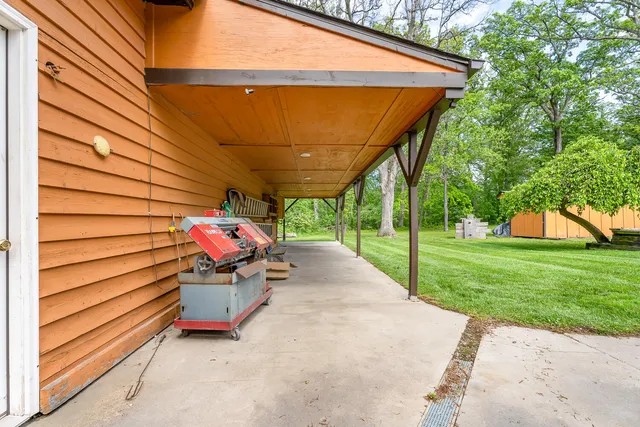 a view of a yard with an outdoor space