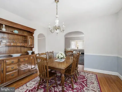 a kitchen with stainless steel appliances a stove refrigerator sink and cabinets