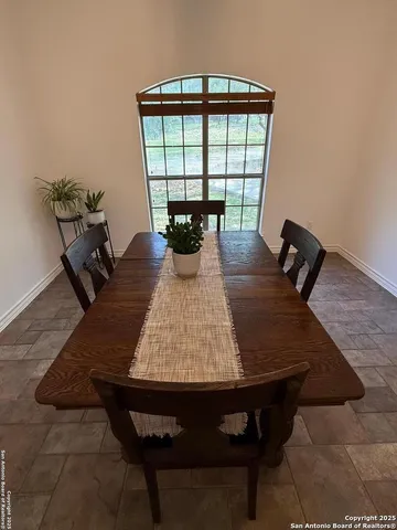 a kitchen with a sink and a microwave