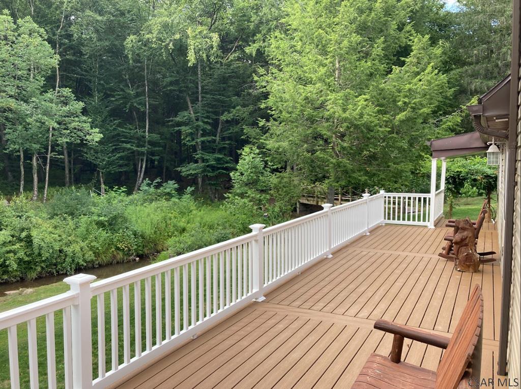 891 Shaffer Run Road Fairhope, PA 15538 - Photo 25 of 38 a view of balcony with deck and trees
