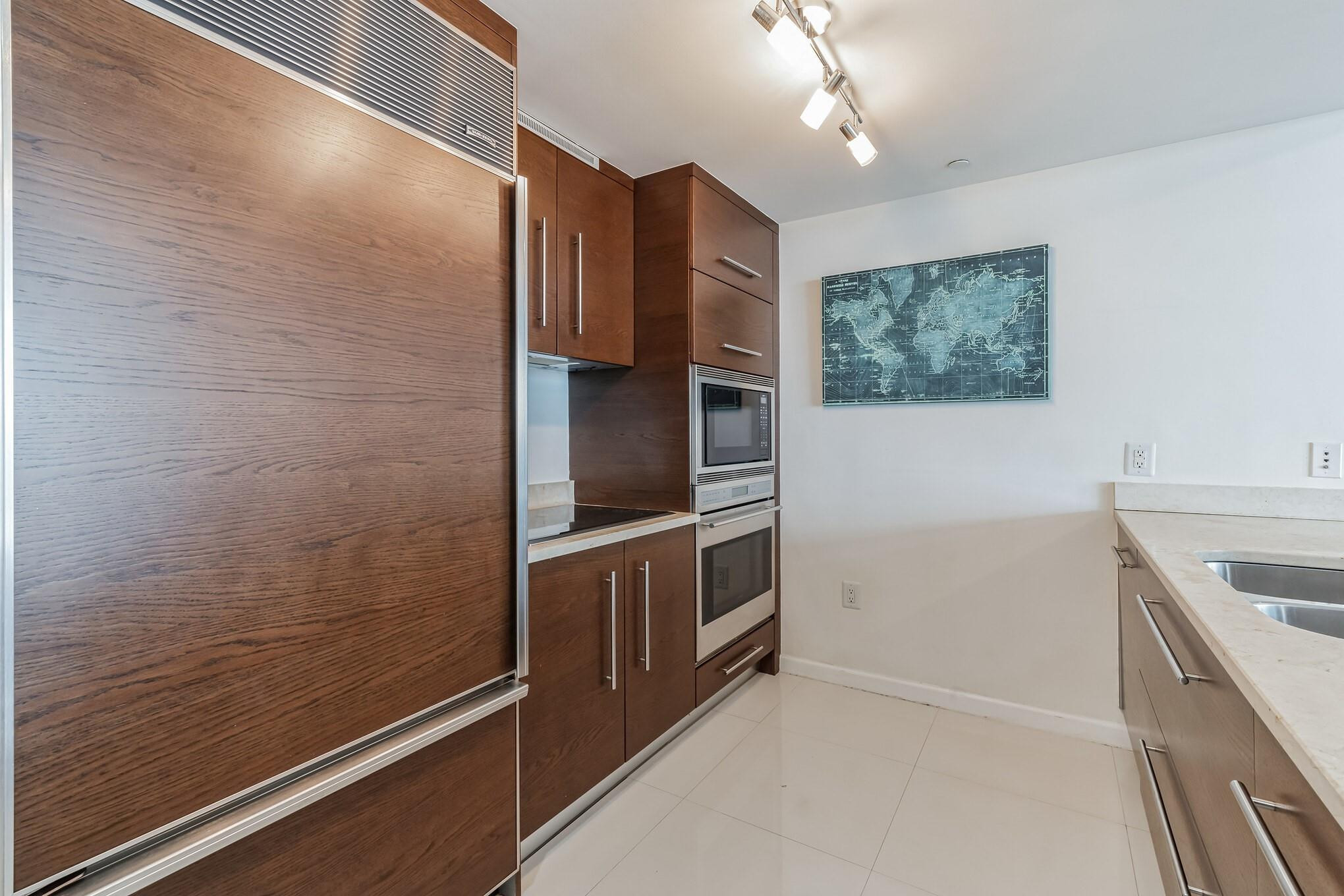 475 Brickell Avenue, Unit 512 Miami, FL 33131 - Photo 12 of 36 a view of cabinets with entryway