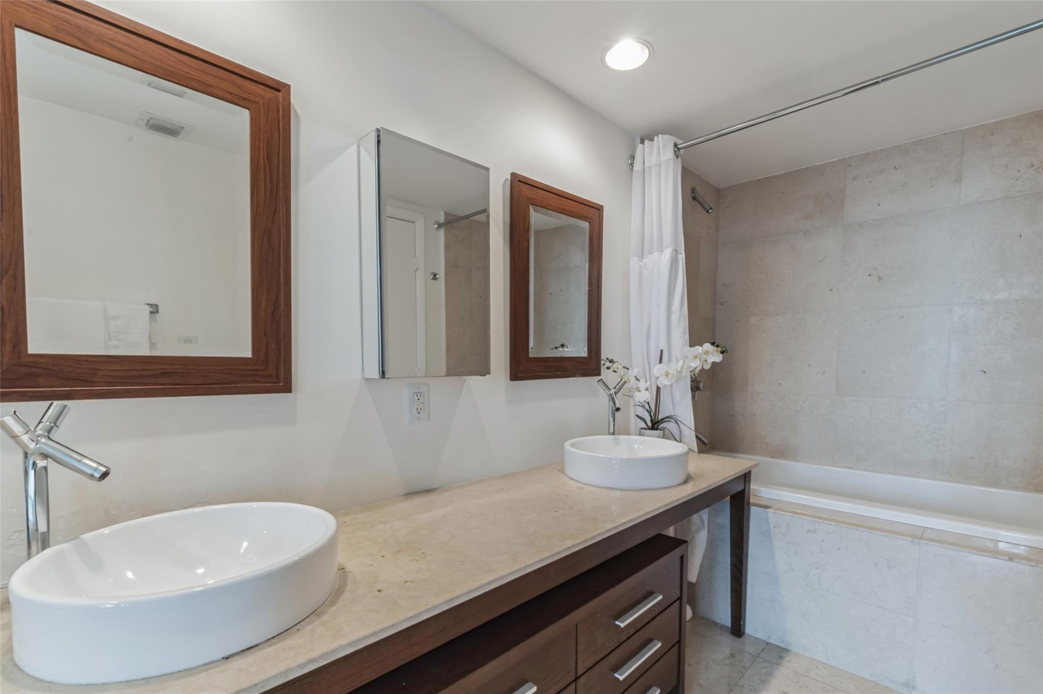 475 Brickell Avenue, Unit 512 Miami, FL 33131 - Photo 15 of 36 a bathroom with a sink and a mirror