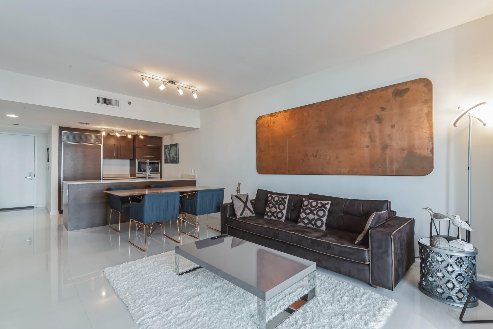 475 Brickell Avenue, Unit 512 Miami, FL 33131 - Photo 17 of 36 a living room with furniture and view of kitchen