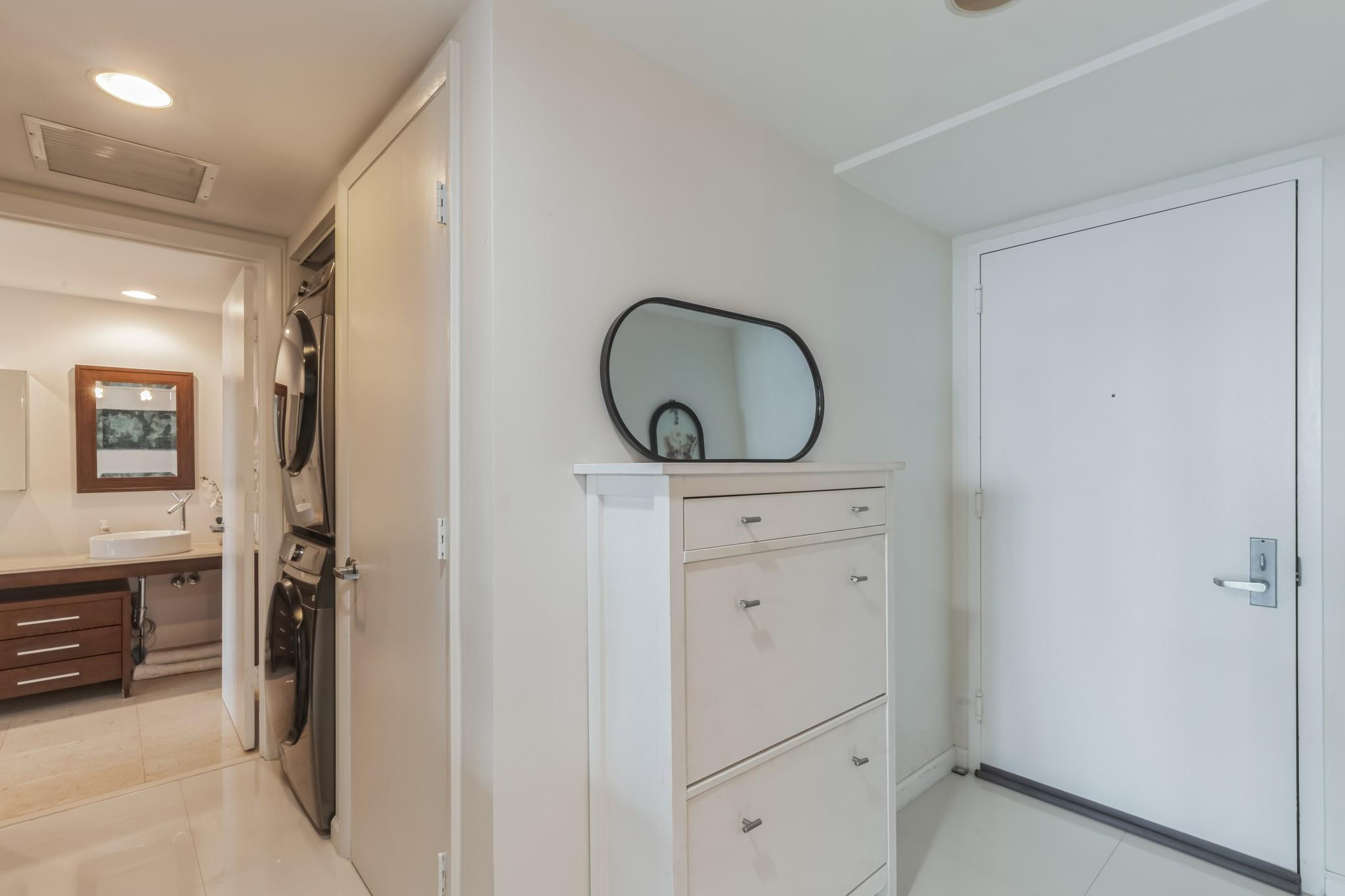 475 Brickell Avenue, Unit 512 Miami, FL 33131 - Photo 21 of 36 a bathroom with a sink and a mirror