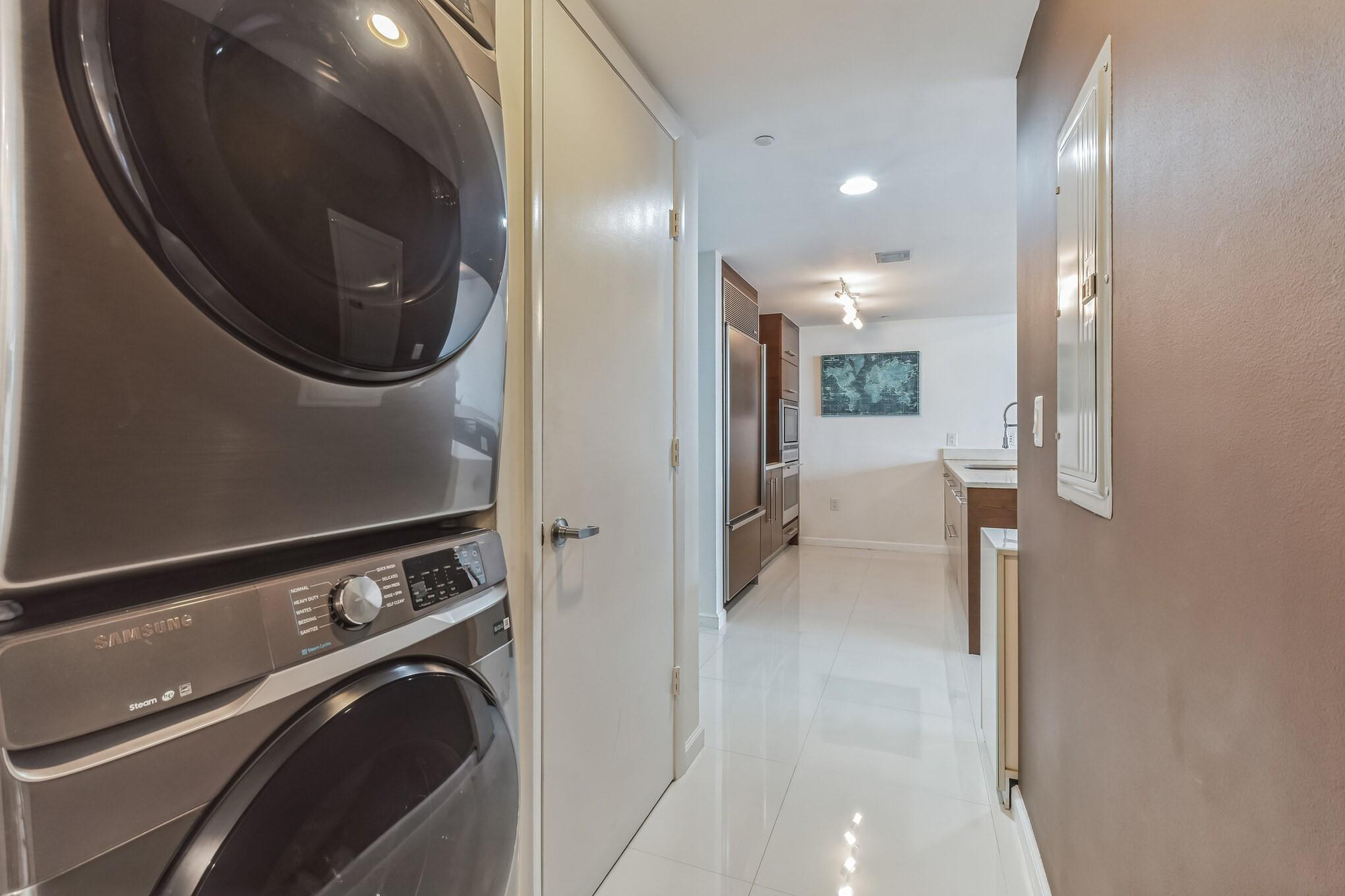 475 Brickell Avenue, Unit 512 Miami, FL 33131 - Photo 26 of 36 a view of a hallway with washer and dryer
