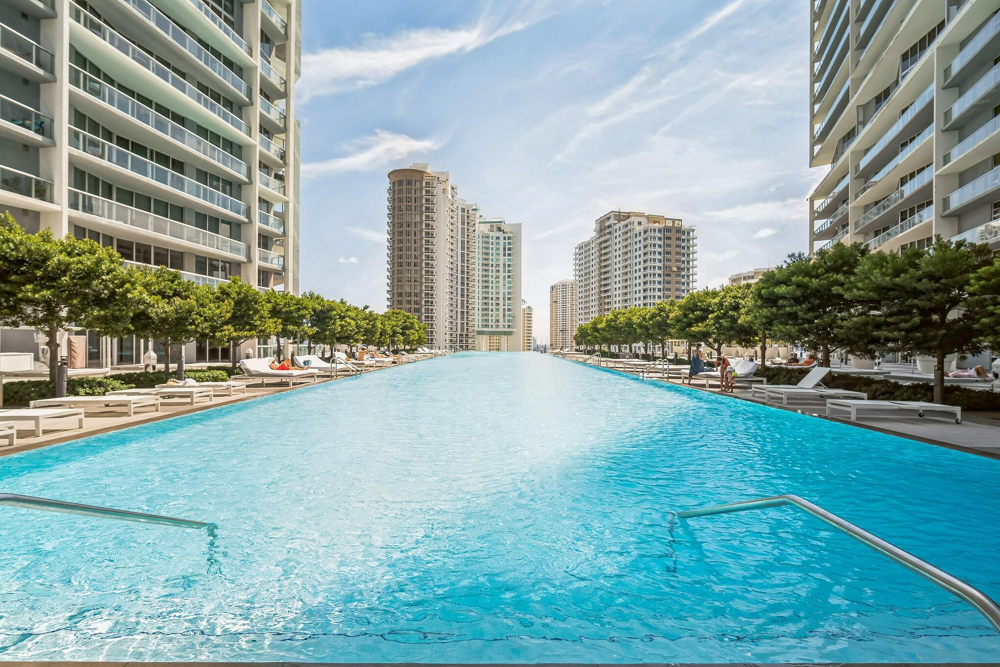 475 Brickell Avenue, Unit 512 Miami, FL 33131 - Photo 30 of 36 a swimming pool with outdoor space and seating area