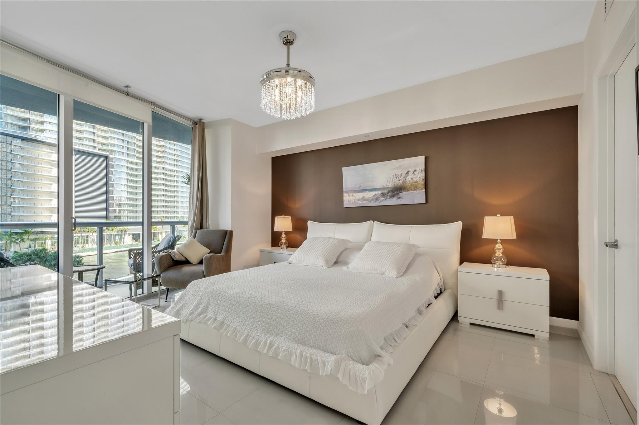 475 Brickell Avenue, Unit 512 Miami, FL 33131 - Photo 4 of 36 a bedroom with bed and large windows