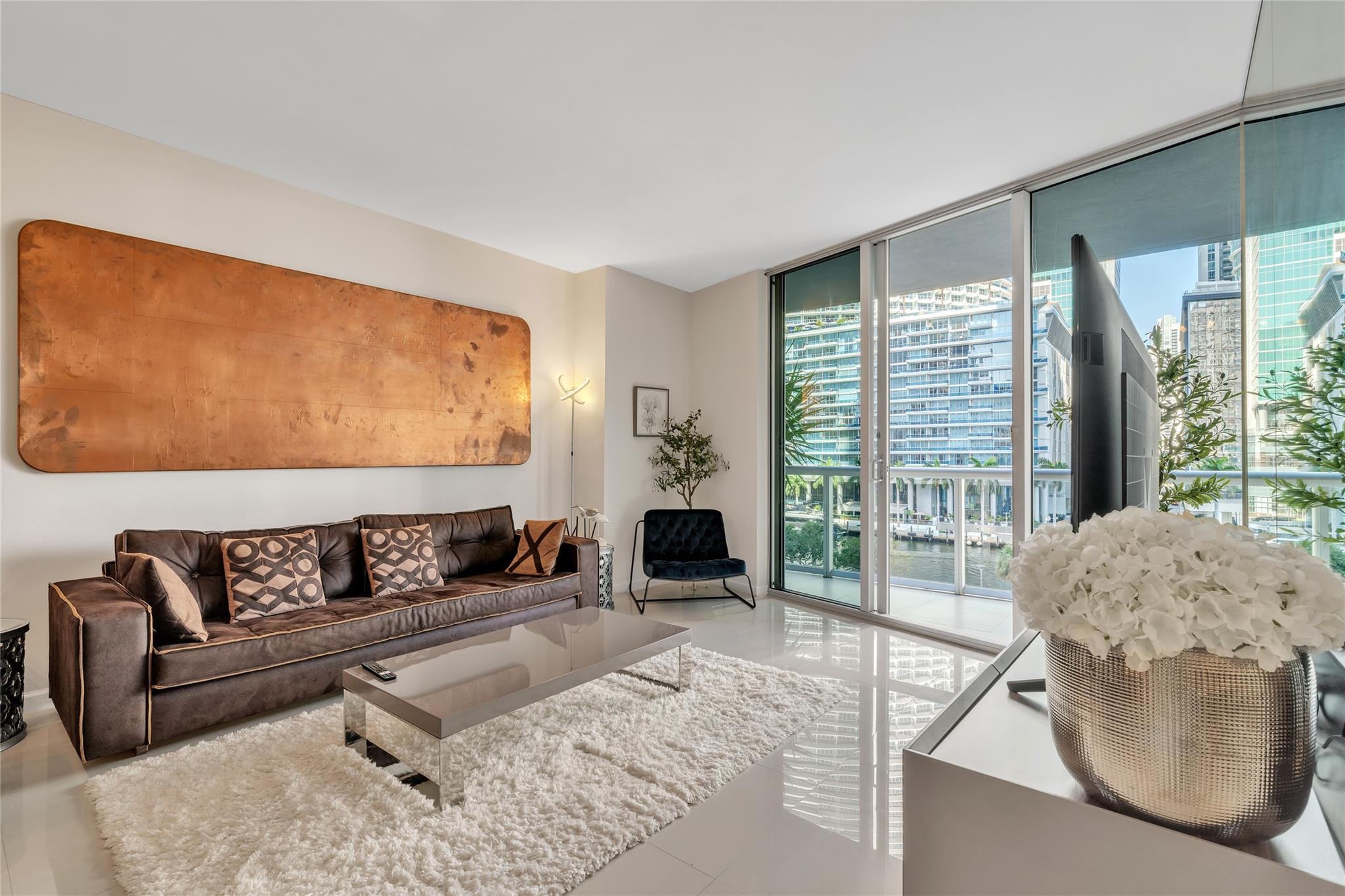 475 Brickell Avenue, Unit 512 Miami, FL 33131 - Photo 7 of 36 a living room with furniture and a large window