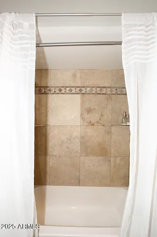 a bathroom with a bathtub