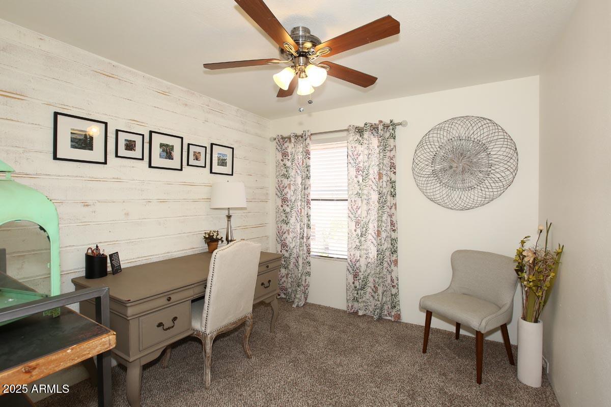 10408 North 11th Place, Unit 3 Phoenix, AZ 85020 - Photo 20 of 31 a workspace with furniture and a fan