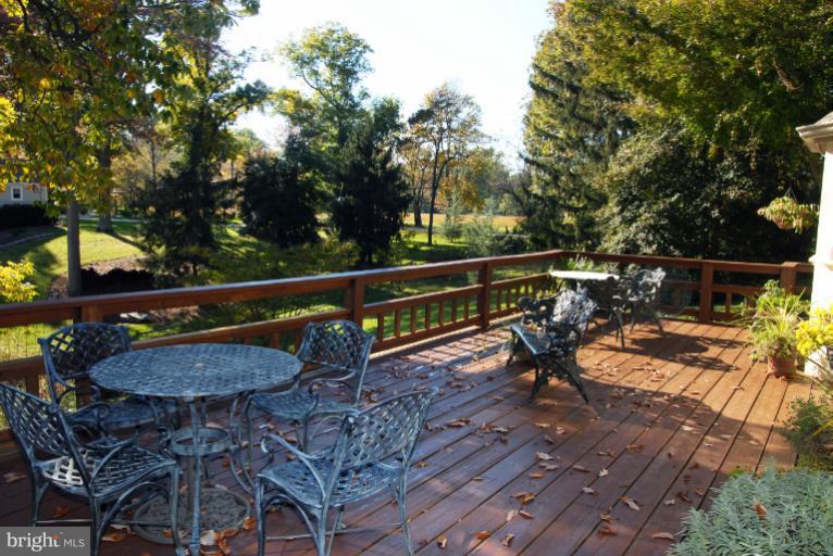 1821 Hidden Point Road Annapolis, MD 21409 - Photo 2 of 30 a view of a wooden deck with furniture