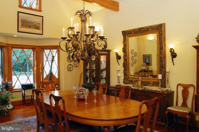 1821 Hidden Point Road Annapolis, MD 21409 - Photo 11 of 30 a view of a dining room with furniture and window